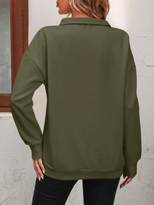 Back view of army green quarter-zip sweatshirt with ribbed cuffs on a model