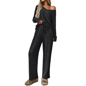 Women's 2-piece black ribbed knit lounge set with V-neck long sleeve top and wide leg pants