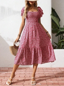 Close-up of square neck floral dress with smocked bodice and ruffled short sleeves