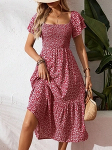 Detail of square neckline and smocked bodice on red floral summer maxi dress