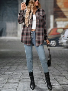 Plaid long-sleeve shirt styled with high-waist jeans and a quilted chain crossbody bag