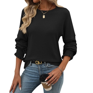 Loose black ribbed knit long sleeve T-shirt for women with elegant ruffled cuffs detail