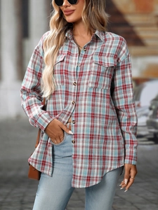 Detailed view of women's casual plaid shirt with classic button-up chest pockets and collar