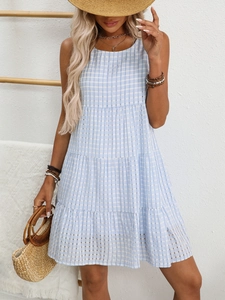 Light blue gingham tiered sleeveless dress for summer, featuring a flowy relaxed fit