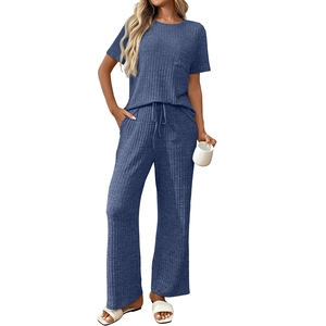 Two-piece ribbed lounge set with short sleeve pocket top and drawstring wide leg pants