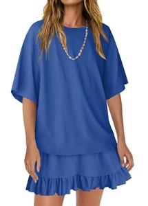 Detail of royal blue casual two-piece set featuring short sleeve t-shirt and pleated skirt