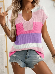 Detail of colorful striped knit sweater with deep V-neck and contrasting white collar