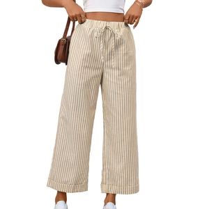 Pantaloni a gamba larga a righe verticali beige e bianche a vita alta con coulisse decorativa
