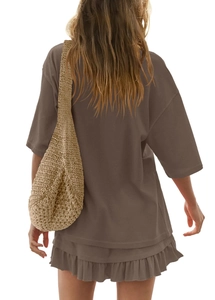 Rear view of coffee brown two-piece summer set with loose t-shirt and ruffled mini skirt