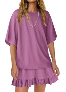Detail of summer casual set featuring purple crewneck t-shirt and layered ruffle skirt