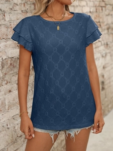 Detail of navy blue knit top with ruffle sleeves and diamond hollow-out texture