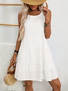 Detailed view of white plaid jacquard texture on tiered sleeveless summer maxi dress