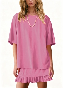 Detail showing pink summer two-piece set with drop-shoulder tee and ruffled hem skirt