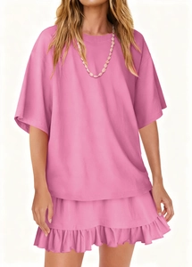 Detail view of pink round neck short sleeve t-shirt and layered ruffle skirt two-piece set