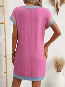 Detail of pink waffle knit dress featuring striped trim and back view on model