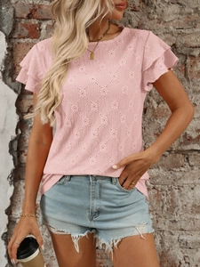Detailed view of pink short sleeve top featuring hollow knit texture and layered ruffle sleeves
