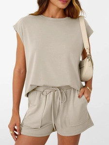 Detail of oatmeal short sleeve lounge set showing drawstring waist and patch pockets