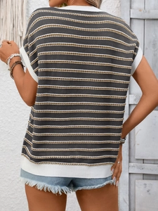 Detail view of the back of a women's striped knit vest with white ribbed hems