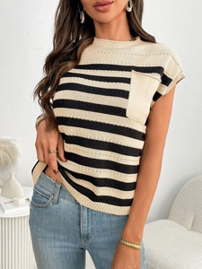Detailed texture of women's crewneck striped knit top with classic chest pocket detail