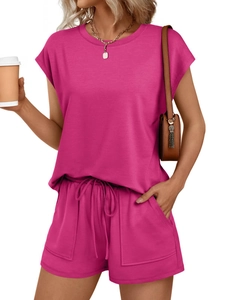 Detail of magenta casual set showing elastic drawstring waist and large pockets