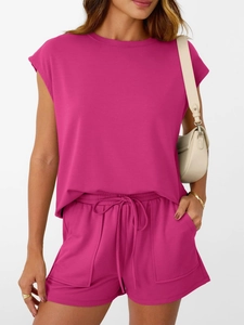 Detail view of pink lounge set featuring side pockets and adjustable drawstring waist