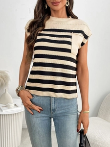 Detail of crew neck knit top with horizontal stripes and decorative chest pocket