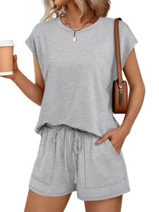 Detail of grey short sleeve lounge set featuring elastic drawstring waist and large pockets