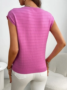 Detail showing the textured horizontal stripes and ribbed cuffs of this pink knit sweater