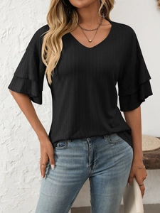 Close-up of black V-neck t-shirt featuring ruffle sleeves and ribbed knit texture