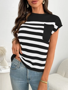 Detail of women's short sleeve striped knit top featuring a black chest pocket and ribbing