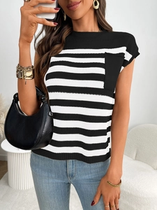 Detailed close-up of a striped knit top showing the fabric texture and contrast chest pocket