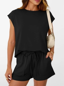 Detailed view of women's black loungewear set featuring soft knit fabric and drawstring waist