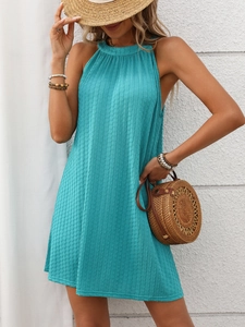 Detailed texture of turquoise halter sleeveless mini dress with vertical ribbed fabric