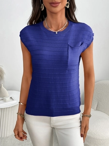Close-up of navy striped short sleeve knit top with chest pocket and textured fabric detail