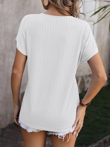 Rear view of white ribbed knit short sleeve T-shirt with curved hem for women