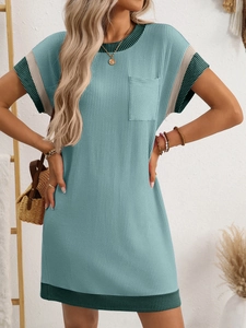 Detail of waffle knit fabric and contrast striped trim on casual short sleeve dress