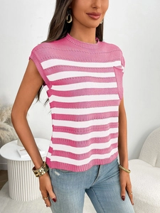 Detail of pink and white striped knit top showing the round neck and chest pocket