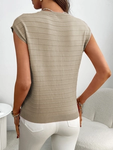 Detailed knit texture of light brown sleeveless sweater with horizontal patterns