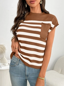 Detail of a brown and white striped sleeveless knit top with a solid chest pocket and soft texture
