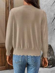 Rear view of a khaki knit cardigan featuring long sleeves and a delicate wavy hemline