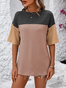 Close-up of three-tone color block knit t-shirt with ribbed texture and round neck