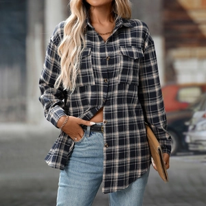 Women's oversized plaid flannel shirt with chest pockets and long sleeves for autumn fashion