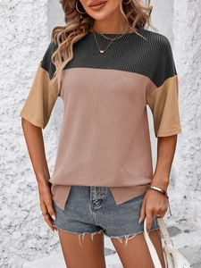 Close-up of waffle knit texture and color block design on women's short sleeve T-shirt