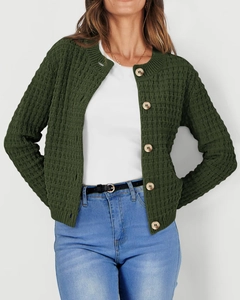 Detail of dark green waffle knit cardigan with large round wooden buttons for women