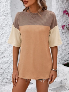 Detail of color-block ribbed knit T-shirt featuring brown, orange, and beige panels