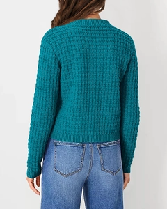 Rear view of long sleeve peacock blue knitted cardigan with textured waffle pattern detail