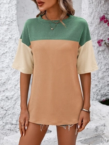 Close-up of color-blocked short sleeve T-shirt with vertical ribbed texture and crew neck