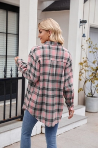 Back view of pink and grey plaid flannel shacket with center pleat and long sleeves