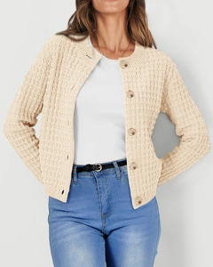 Detailed waffle texture on a cream knit cardigan with tortoiseshell buttons for women