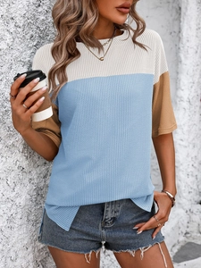 Detail of color-block crewneck t-shirt with vertical stripe texture and side slits